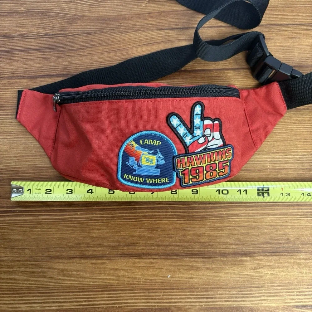 Stranger Things Hawkins 1985 Fanny Pack & Hawkins Horrors Book Lot Netflix